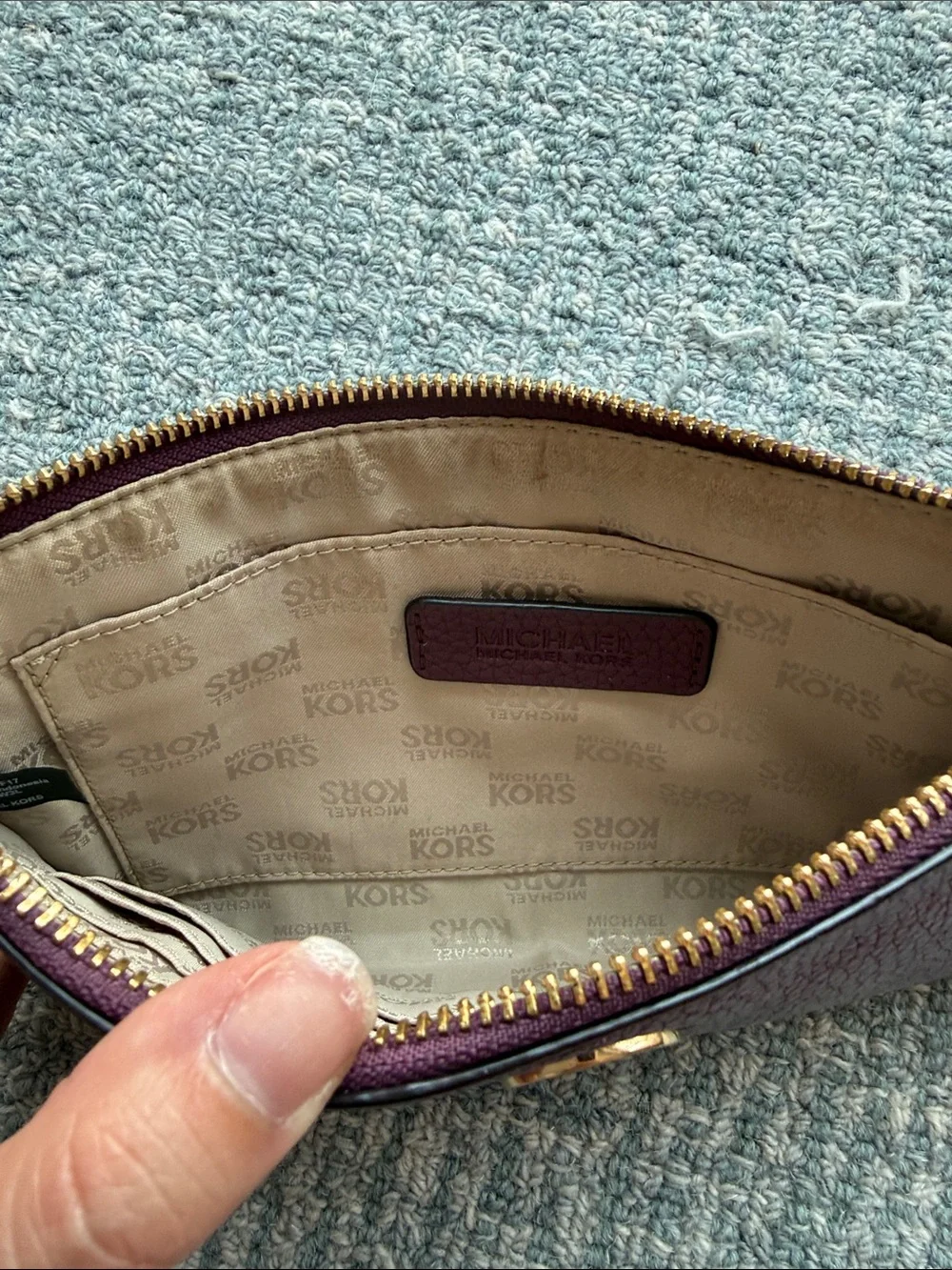 Michael Kors Plum Pebbled Leather Wristlet Clutch with Gold MK Logo